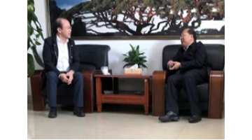 来宾市委书记农生文与腾博官网董事长王双飞座谈交流环保相助